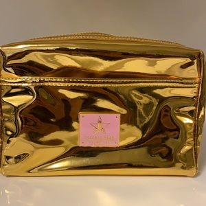 Jeffree Star gold cosmetic bag